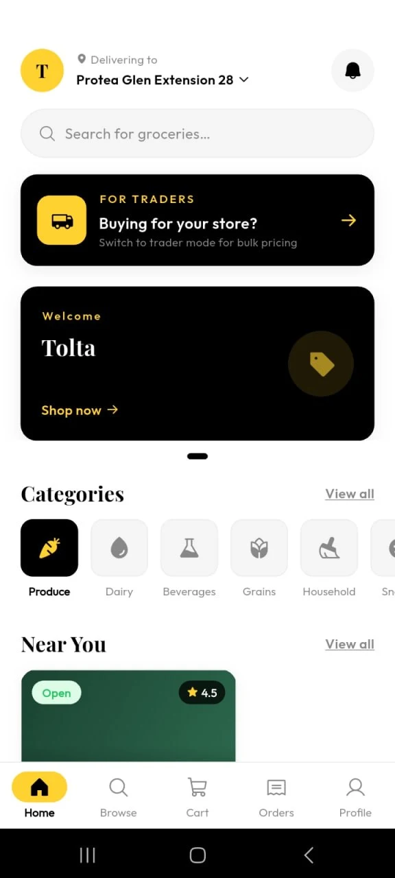 Tolta home screen showing grocery categories and nearby stores